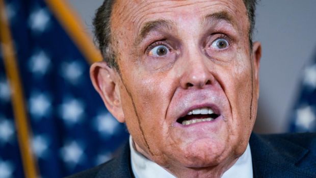 What caused Rudy Giuliani's bizarre hair malfunction?