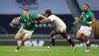Ireland’s Chris Farrell is tackled by England’s Maro Itoje during the Autumn Nations Cup match at Twickenham. Photograph: Julian Finney/Getty