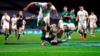 Ireland’s Jacob Stockdale scores a try during the Autumn Nations Cup against England at Twickenham. Photograph: Adrian Dennis/AFP via Getty Images