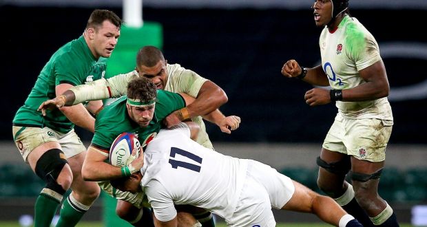 Ireland’s Caelan Doris is tackled by Ellis Genge of England during the Autumn Nations Cup game at  Twickenham. Photograph: Craig Mercer/Inpho