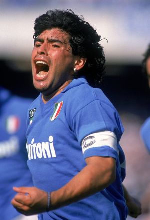 Diego Maradona celebrates a goal against AC Milan in Naples in 1988. Photo: Dave Cannon /Getty Images
