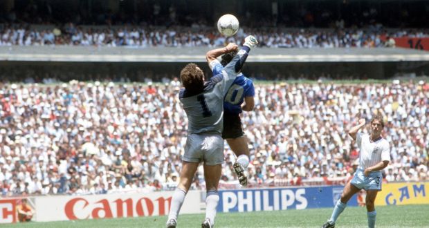 Argentina’s Diego Maradona scores his ’Hand of God’ goal past English goalkeeper Peter Shilton at the 1986 World Cup. Photo:  Bob Thomas/Getty Images