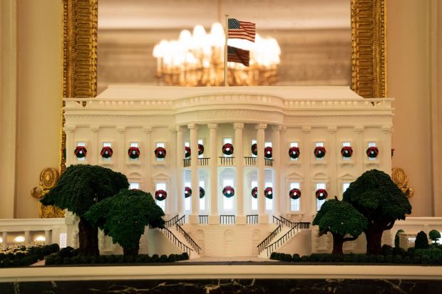 A re-creation of the White House made from 125kg of gingerbread dough, 50kg of pastillage dough, 13.5kg of gum paste, 11.5kg of chocolate and 11.5kg of royal icing. Photograph: Doug Mills/New York Times