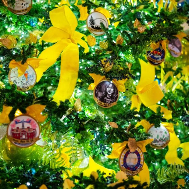 One of the trees in the display features ornaments from each state and yellow ribbons. Photograph: Doug Mills/New York Times