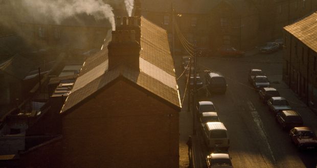 Smog caused by burning smoky coal and peat fires pollutes the air over a housing estate in Dublin, in 1988. File photograph: Tom Stoddart/ Getty