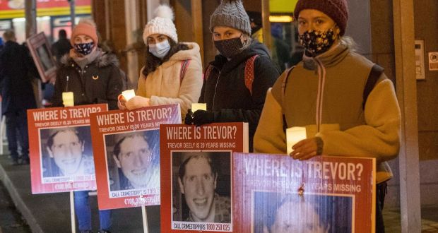 Friends and family gathered at Baggot Street Bridge, Dublin, on Monday to mark the 20th anniversary of Trevor Deely’s disappearance. Photograph: Collins Photos