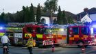 Emergency service personnel attend the scene of the house fire  in Dundrum, Dublin. Photograph: Damien Storan