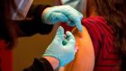A doctor receiving Moderna’s Covid-19 vaccine at Hartford hospital in Connecticut. The Pfizer BioNTech vaccine has been approved for distribution in Ireland and other EU member states.  Photograph:  Getty Images