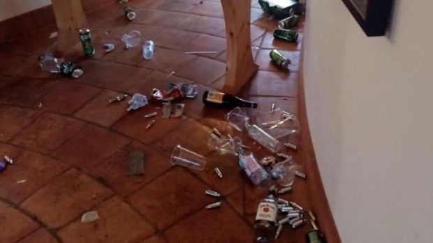 Used nitrous oxide ‘laughing gas’ canisters, and other rubbish strewn across the floor. Photograph: Lisa Wilkinson