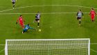 Newcastle goalkeeper Karl Darlow saves a shot from Mohamed Salah. Photograph: Stu Forster/PA