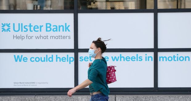 A woman passes Ulster Bank’s office on George’s Quay in Dublin wearing a face mask. The FSU trade union has called on the Government to make the wearing of face masks inside bank branches compulsory in the wake of the latest surge in the Covid infection rate. Photograph: Sasko Lazarov/Rollingnews.ie 