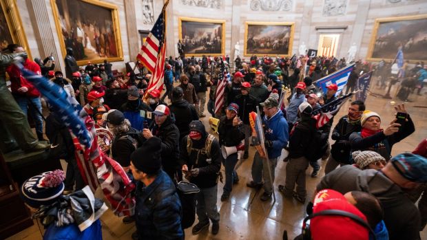 A mob of supporters of president Donald Trump in the Capitol Rotunda after breaching Capitol security in Washington, DC. Photograph: Jim Lo Scalzo/EPA