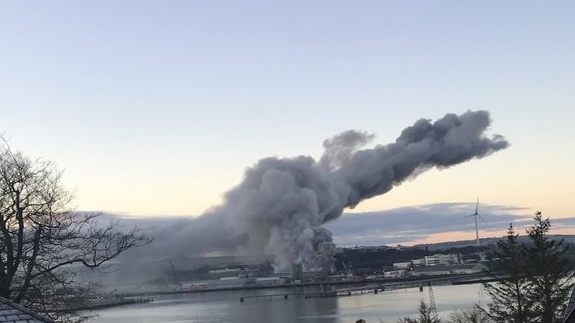 Large fire in a grain storage facility in Cork harbor brought under control