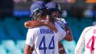India’s Ravichandran Ashwin and Hanuma Vihari embrace after India’s draw with Australia. Photograph: David Gray/Getty/AFP
