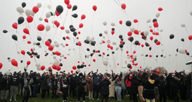 Friends and relations of George Nkencho release balloons to commemorate his life near the spot where he was shot dead outside his home by armed gardaí in Clonee, west Dublin, on  December 30th. Photograph: Niall Carson/PA Wire