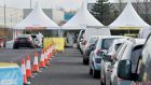 Cars  line up at the RocDoc rapid Covid test centre based  at Dublin Airport on Friday. Photograph: Alan Betson / The Irish Times