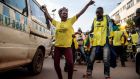 Supporters of the National Resistance Movement celebrate the victory of president Yoweri Museveni in Kampala, Uganda. Photograph:  Badru Katumba/AFP via Getty 