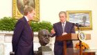 Former US president George W Bush  accepting loan of a bust of former British prime minister Winston Churchill from British ambassador Sir Christopher Meyer  in the Oval Office  in July 2001. Photograph:  Getty Images
