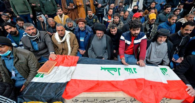 Iraqi mourners pray over the coffin of a victim  in the twin suicide bombing in central Baghdad on Thursday which killed 32 and wounded 110. Photograph: Ali Najafi/AFP via Getty Images