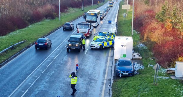 The checkpoints were switching between different sides of the road, meaning people travelling to or from the airport were being checked at different times. Photograph: Conor Lally
