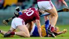 Tipperary’s Séamus Callanan tackled by Galway’s Adrian Tuohy  late in the All-Ireland quarter-final at the Gaelic Grounds. Photograph: James Crombie/Inpho