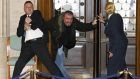 Security personnel detain and disarm Michael Stone in the lobby of the Stormont parliament buildings in Northern Ireland on November 24th, 2006. Photograph: Stephen Hird/Reuters