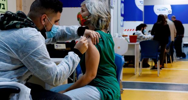 A health workers administers a dose of the Pfizer-BioNtech Covid-19 vaccine in Tel Aviv. Photograph: Jack Guez/AFP via Getty Images