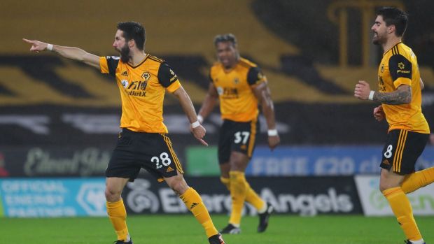 Joao Moutinho celebrates scoring Wolves’ winner against Arsenal. Photograhp: Catherine Ivill/Getty/AFP