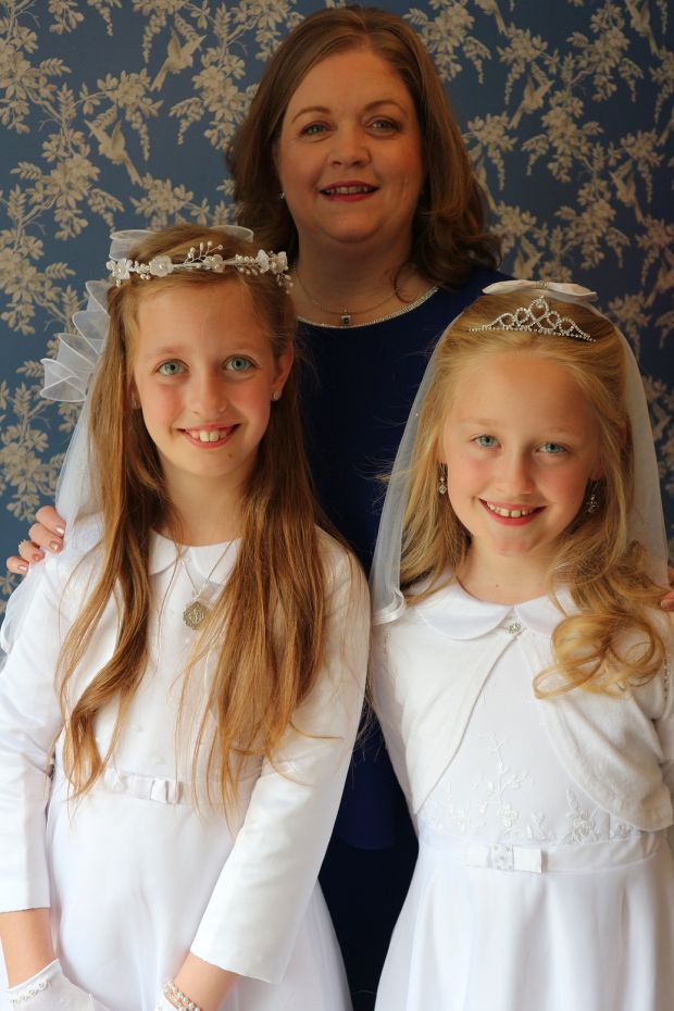 Annmarie Sliney with her twin daughters Méabh and Áine.