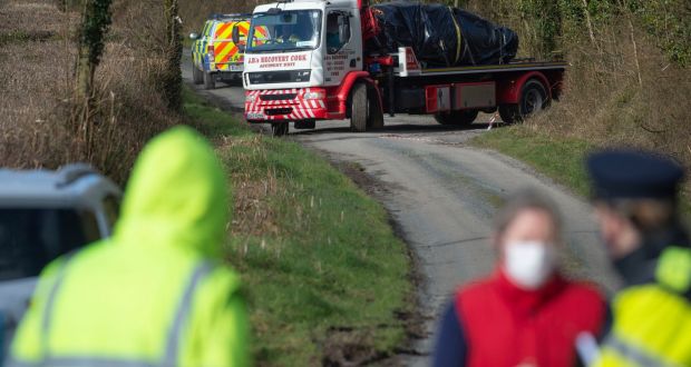 The removal of the burnt-out car  from Dromdeer Woods near Doneraile, Co Cork. Photograph:  Michael Mac Sweeney/Provision