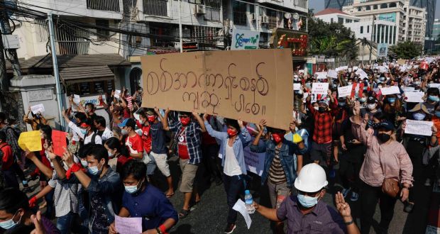 Demonstrators march during a protest against the military coup in Yangon, Myanmar. Photograph: Lynn Bo Bo/EPA