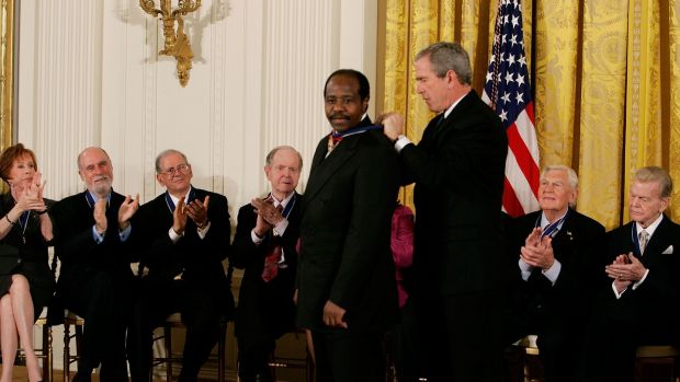 Paul Rusesabagina recieves the US Presidential Medal of Freedom from George W Bush at the White House on November 9th, 2005. Photograph: Mark Wilson/Getty Images