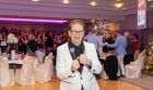 Martin Duffy, known in the industry as Scruffy Duffy, entertaining at a pre-pandemic wedding.
