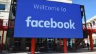 A file photo shows a giant digital sign at Facebook’s corporate headquarters campus in Menlo Park, California. Facebook said on Tuesday it will lift a contentious ban on Australian news pages in the coming days. Photograph: JOSH EDELSON/AFP via Getty Images