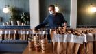 Sean Connaughton, manager at Host restaurant in Ranelagh,  preparing the meal kits for collection. Photograph: Dara Mac Dónaill 