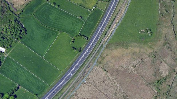 Curtuan ringfort cut in half by a motorway. Photograph: Ordinance Survey Ireland