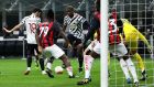 Paul Pogba scores the winner for Manchester United in Milan. Photograph: Getty Images