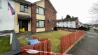 The scene at a house  at  Derrycoole Way, Newtownabbey, after police began  a murder investigation after three bodies were found at separate properties. Photograph: PA 