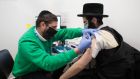 A man receives a Covid-19 vaccination on Sunday at a coronavirus vaccine clinic in Green Lanes, north London, for the local Orthodox Jewish community. Photograph: Stefan Rousseau/PA Wire 