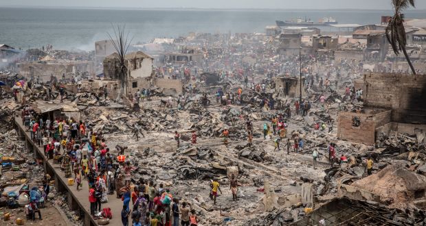 A fire broke out in the night of March 24th at Susan’s Bay slum in Freetown, Sierra Leone. Photograph: Sally Hayden