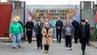 Church leaders from both communities gather at a gate in the peace wall at Larnark Way in west Belfast calling for the recent nightly violence to stop. Photograph: Paul Faith/ AFP via Getty