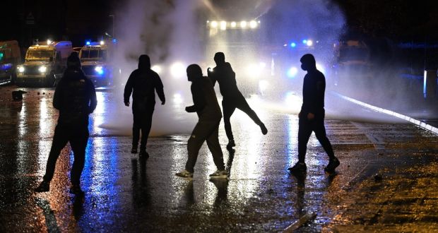  Police deploying water canons on Springfield Road, Belfast last week. A new generation of young people are being drawn into the violence that plagued their parents’ lives. Photograph: Charles McQuillan/Getty
