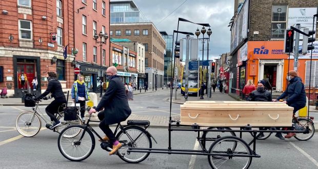 Paddy Cahill’s brother Conor cycled his coffin to Glasnevin Cemetery in a bicycle-drawn hearse. Photograph: Ronan McGreevy