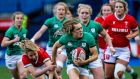 Ireland’s Béibhinn Parsons goes past Elinor Snowsill of Wales during the Women’s Six Nations match at  Cardiff Arms Park. Photograph: Robbie Stephenson/Inpho