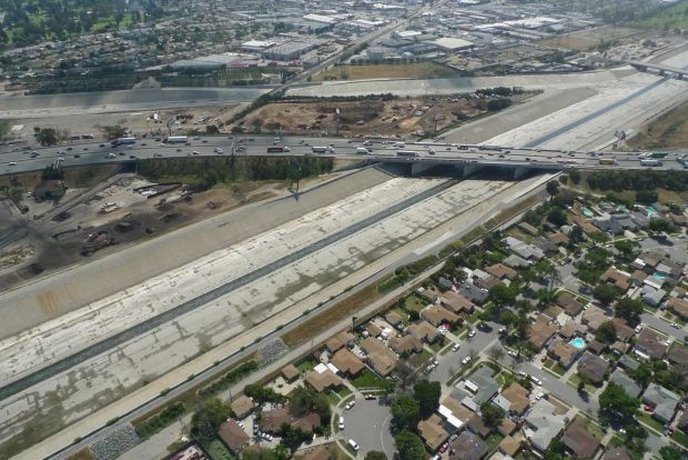 Aerial view of the Los Angeles River, now a flood control channel remade with concrete. The site for the new SELA Cultural Center will be at top right, past the 710 Freeway. Photograph: Gehry Partners