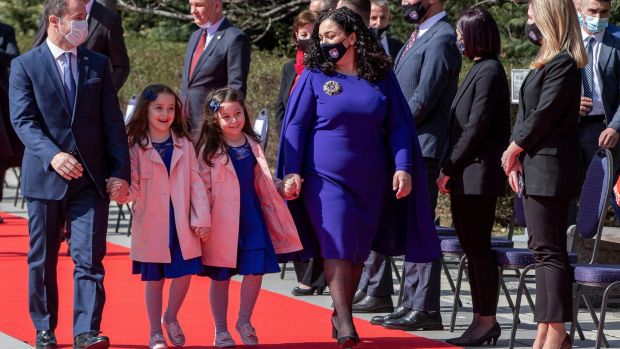 Kosovo’s newly elected president, Vjosa Osmani, with her husband and their twin daughters attend the presidential handover ceremony. Photograph: Visar Kryeziu/AP Photo