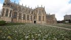 Flowers left as tributes outside St George’s Chapel, at Windsor Castle. Photograph:  Steve Parsons/Pool/Afp via Getty