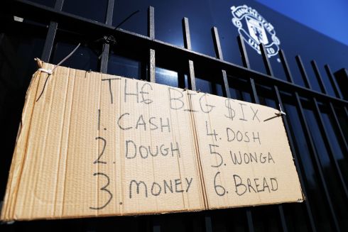 A sign posted by football fans opposing the European Super League outside Old Trafford in Manchester. Photograph: PA