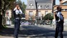 Terrorism investigation launched as police worker stabbed to death in France