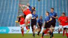 Leinster’s Dave Kearney and Munster’s Shane Daly contest a high ball during  the  Rainbow Cup clash at the  RDS. Photograph: Ryan Byrne/Inpho  